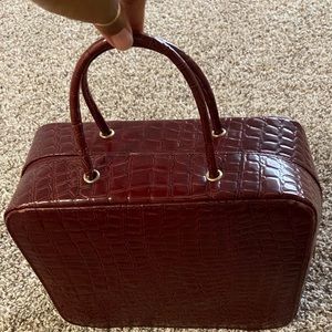 Maroon Estēe Lauder Bag